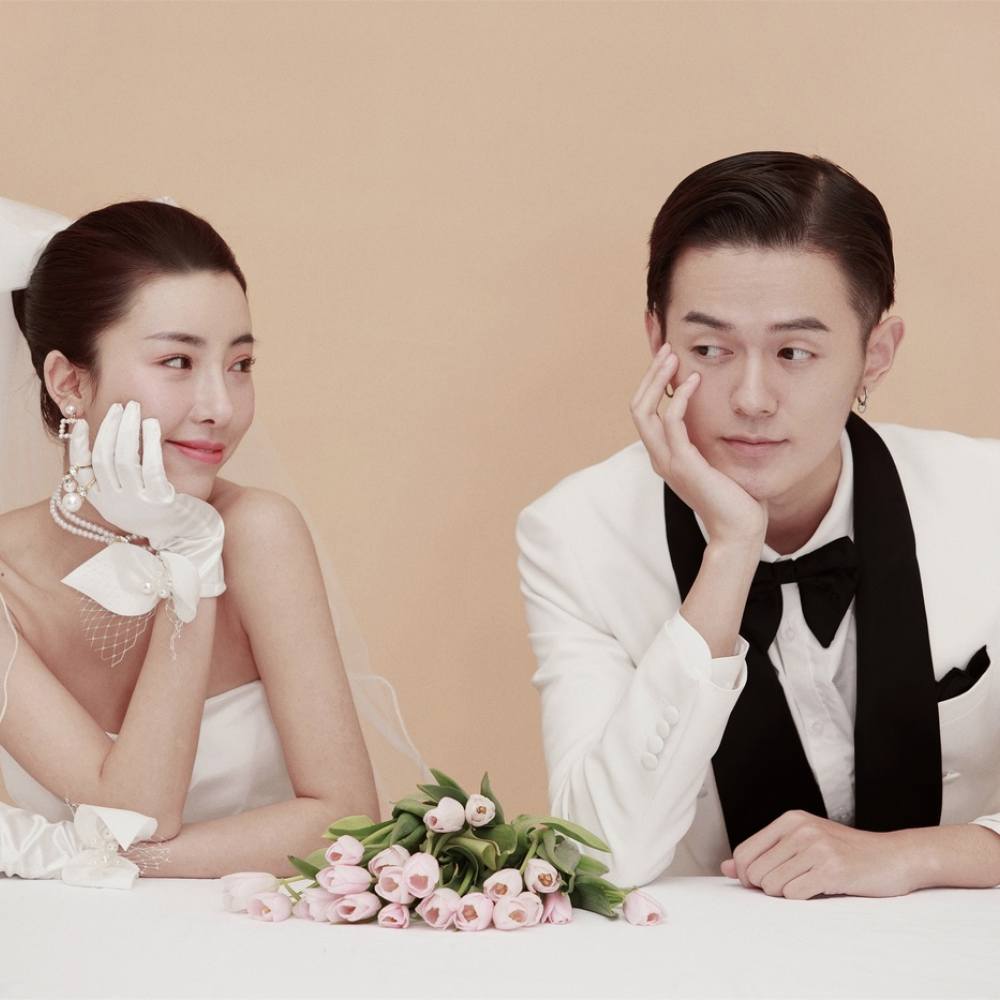 双嘻纪婚纱摄影