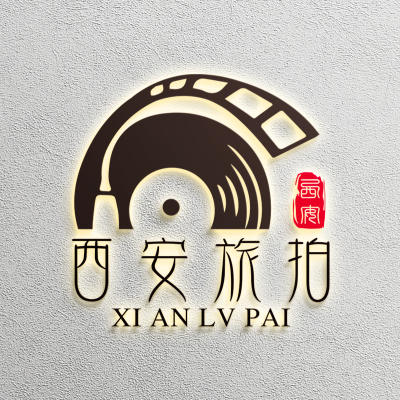 吴起全球旅拍logo